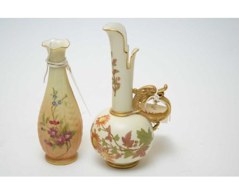 A Royal Worcester dragon handled ewer, the body decorated with floral sprays in autumnal hues, pattern No. 1026, 16cms high; 