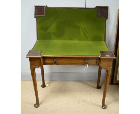A Georgian mahogany card table, the hinged folding top with baize lined playing surface, single drawer to frieze, lappet shou