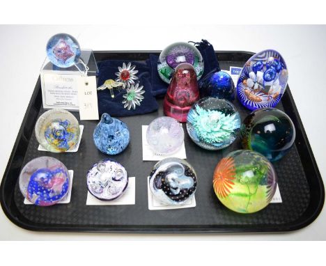 A collection of Caithness glassware, comprising: fourteen glass paperweights, including: Reflections, miniature Moon Flower, 