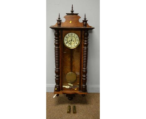 A Vienna walnut wall clock, circa 1900, with arabic dial, subsidiary seconds and fluted half-column sides, with weights and w