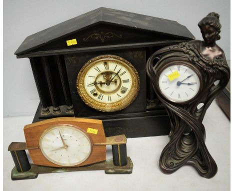 An American black slate mantel clock, the movement signed 'Ansonia Clock Co'; together with an Art Nouveau style figural mant