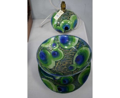 A contemporary Dartington Pottery oblong dish, designed by Janice Tchlenko, with peacock motif decoration, approximately 42cm