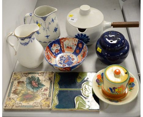 A selection of decorative ceramics, including: a Clarice Cliff 'Crocus Bizarre' preserve jar and cover (damaged), with matche