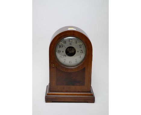 An Edwardian Boulle mantel clock, in domed inlaid walnut case, 36cms high.