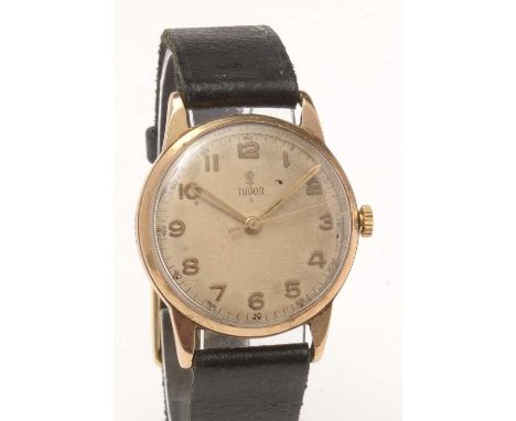 A 9ct yellow gold cased Tudor wristwatch, fitted manual wind movement, in case marked 'Rolex', in black leather strap. 