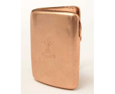An Edwardian 9ct gold cigarette case, the cover engraved with an armorial device, the interior engraved with a presentation i