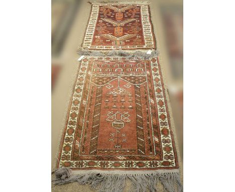 A North West Persian prayer rug, brown field with lantern designs, tarantula style border, 114 x 69cms; and another North Wes