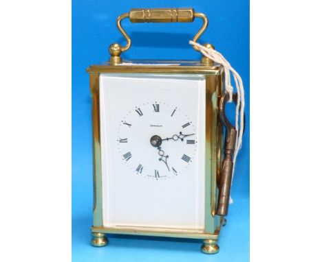 A brass carriage clock by Dominion