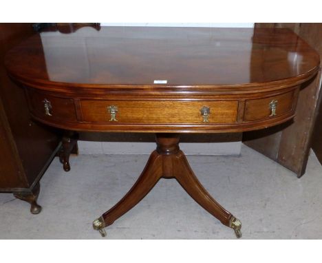 A Georgian style mahogany 'D' shaped side table with 3 frieze drawers, on reeded tripod base