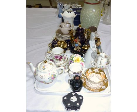 A Poole pottery part tea service; a cabinet coffee set; 2 Hummel figures; other decorative china