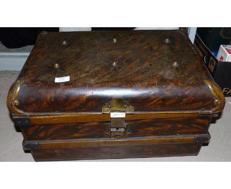 A Victorian tin trunk and contents