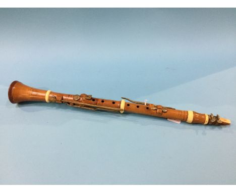 A boxwood and ivory Clarinet, by H. Wrede
