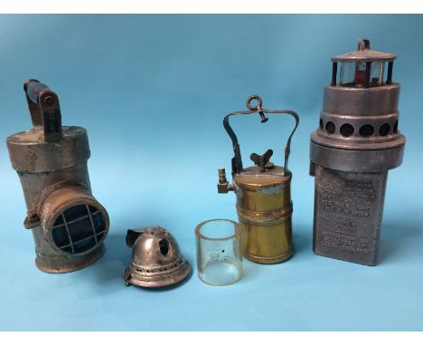 A 'Ringrose' lamp, an NG7 lamp and a small brass lamp