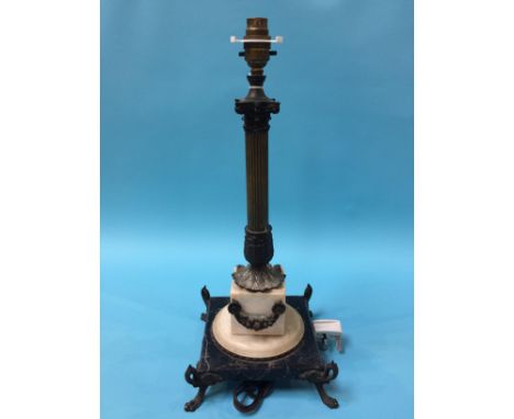 An ornate Corinthian column table lamp