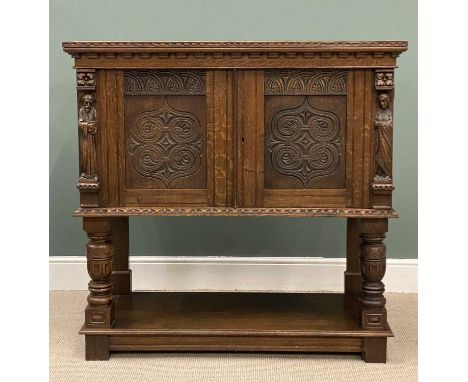 JACOBEAN STYLE CARVED OAK TWO DOOR CUPBOARD, doors with carved figures and Celtic type pattern, above a base shelf, 125 (h) x