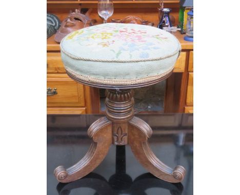 VICTORIAN MAHOGANY TAPESTRY SEATED, REVOLVING PIANO STOOL ON TRIPOD SUPPORTS 