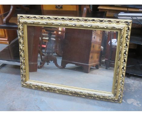 GILDED PIERCEWORK WALL MIRROR, APPROXIMATELY 44cm x 67cm