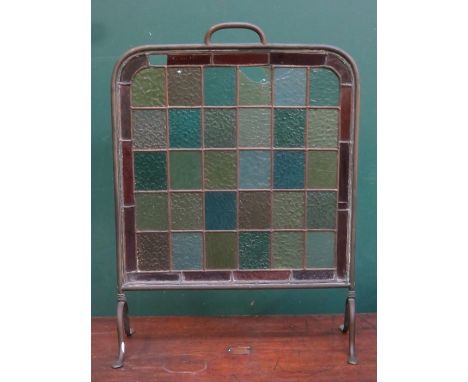 VICTORIAN FIRESCREEN DECORATED THROUGHOUT WITH COLOURED STAINED GLASS PANELS (AT FAULT)