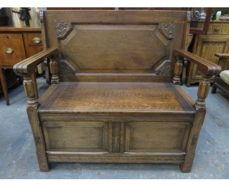 CARVED FRONTED OAK MONK'S BENCH