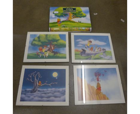 A set of four framed Walt Disney Winnie The Pooh prints with folder, Pooh's Grand Adventure, The Search for Christopher Robin