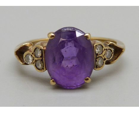 A 9ct gold, amethyst and diamond cluster ring, 2.6g, M 