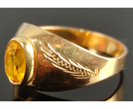 Citrin-Ring, mittig ovaler facettierter Citrin, Vorderseite mit breiter Ringschiene, diese ziseliert mit Ähre, Italien, Arezz
