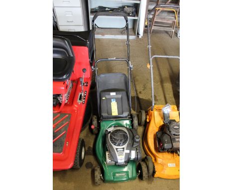 A Qualcast XSS 41D petrol rotary lawn mower with Briggs & Stratton 125cc engine. 