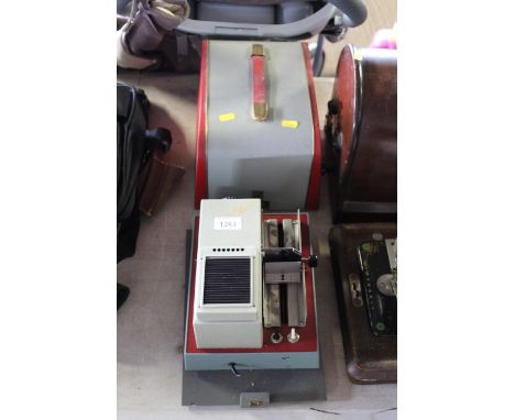 An Autoluxe 300 slide projector in carry case