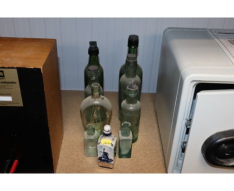 A quantity of vintage glass bottles