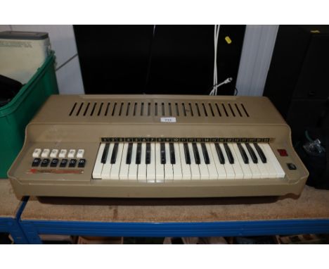 A Magnus electric cord organ, sold as collectors item
