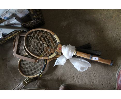 Four vintage wooden tennis rackets