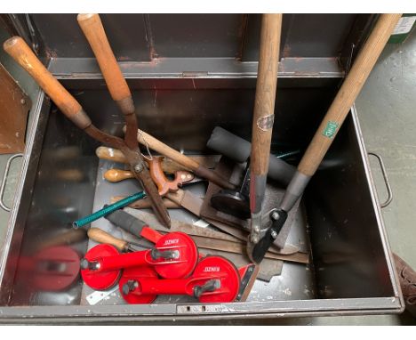 A mixed lot of mainly garden tools to include branch loppers, shears, pruning saws, small shovel, with a metal travel trunk, 