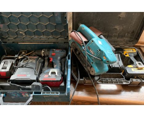 A Bosch GSVB 18V cordless drill, with two batteries; together with a DeWalt 18v cordless drill with two batteries and a Makit