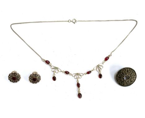 A pretty 925 silver necklace set with red stones, together with a pair of sterling silver Celtic knot clip on earrings and an