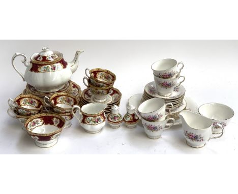 A Royal Albert 'Lady Hamilton' part tea service comprising teapot, cake plate, teacups, side plates, saucers etc, together wi