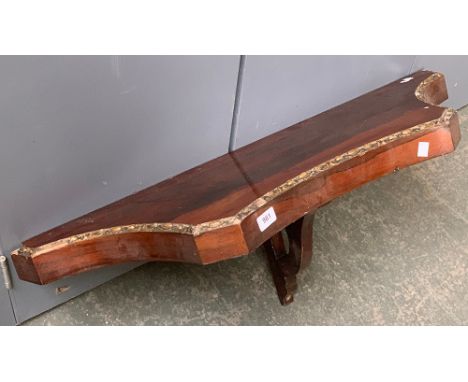 A rosewood and parcel gilt wall bracket shelf 