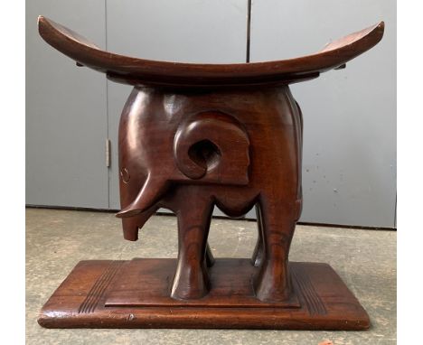 A carved Ashanti elephant stool, 53x30x43cmH (trunk af) 
