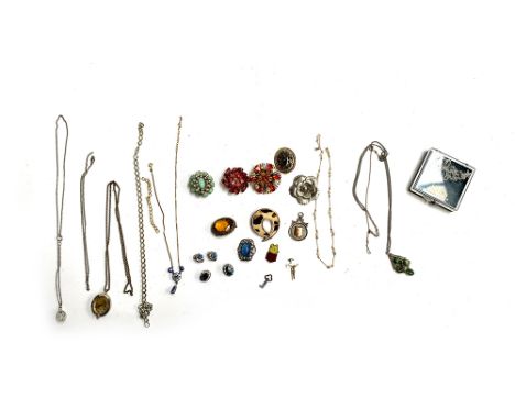 A mixed lot of costume jewellery to include brooches, hallmarked blank silver medal, 6.6g; scarf clip; gold tone chains etc 