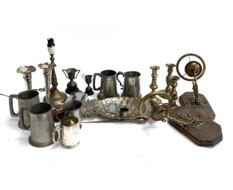 A quantity of brass, pewter and other metal items to include silver handled button hook, candlesticks, tankards, a pair of wa