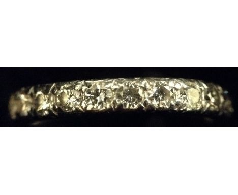 A diamond encrusted full eternity ring, twenty three round brilliant cut diamonds, total estimated diamond weight approx 1,1c