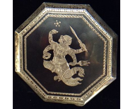 A 20th century Siam silver and neillo octagonal powder compact, octagonal niello panel engraved with Hanuman the Monkey King,