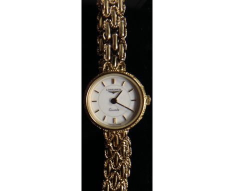 Longines - a lady's 9ct gold dress wristwatch, textured white dial, arrow baton markers, quartz movement, 9ct gold fancy link
