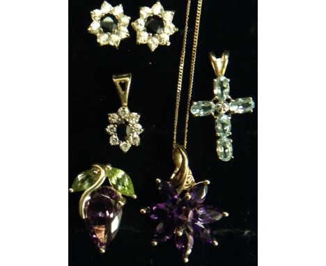 Jewellery - an amethyst eight stone flower pendant, central raised marquise cut amethyst, surrounded by seven conforming peta