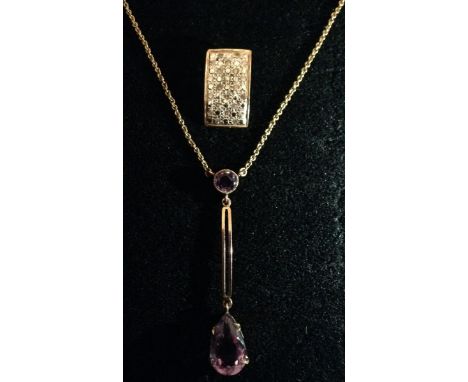 An Edwardian amethyst pendant, pale purple teardrop amethyst suspended from a double bar drop linkage, central round amethyst