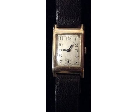 An Art Deco Stolkace ( Elite Bracelet Manufacturing Ltd) 9ct gold wristwatch, rectangular silvered dial, Arabic numerals, sha