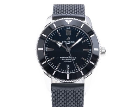 44mm stainless steel large case with rotating bezel and screw down chronograph pushers. The dial is black in colour with date