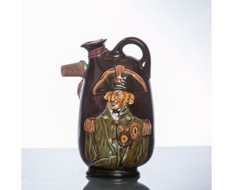 DEWAR'S NELSON CERAMIC FLAGON
Blended Scotch Whisky in Royal Doultin ceramic flagon depicting Nelson in relief and inscribed 