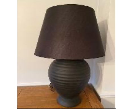 Large stylish lamp with black base:  height 30 inches. Donated by ANON             