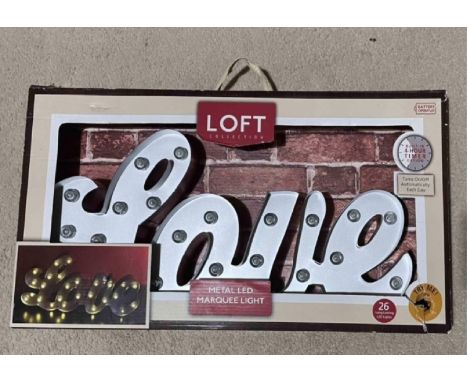 Metal LED Marquee Light. Donated by Gerry  Watkins