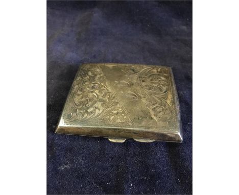 A silver cigarette case hallmarked Birmingham 1902